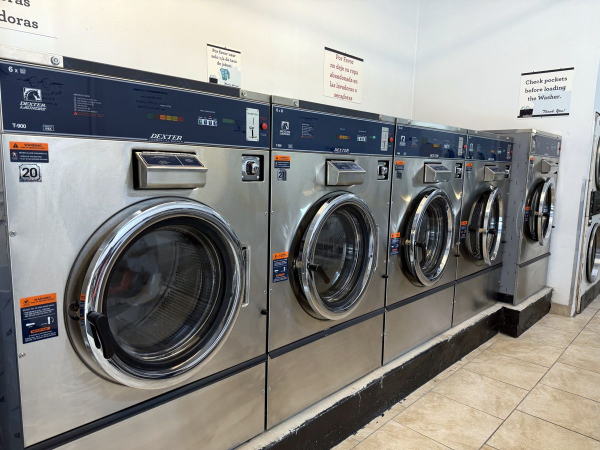 Row of brand-new Dexter washers at the 48th Street laundromat